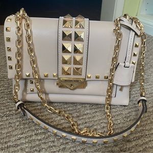 Michael Kors blush bag with pyramid studsBRAND NEW , NEVER WORN